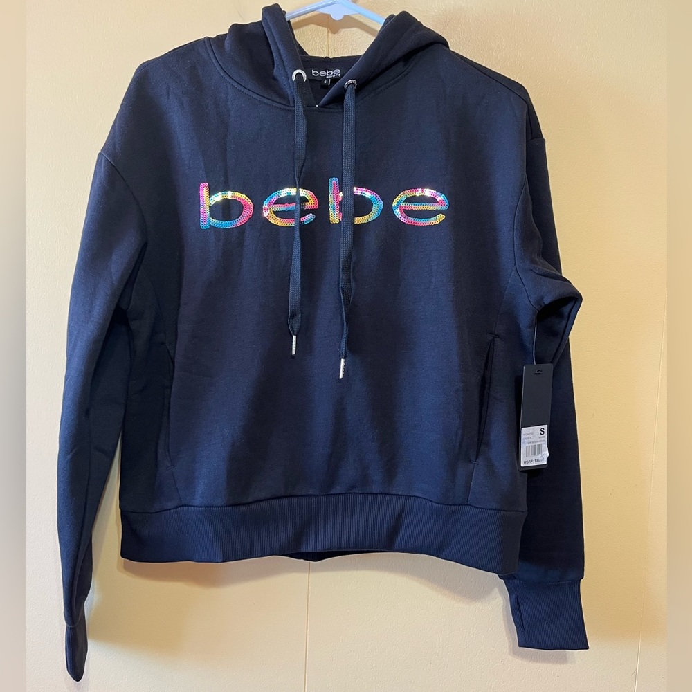 NWT Bebe pullover with two front pockets